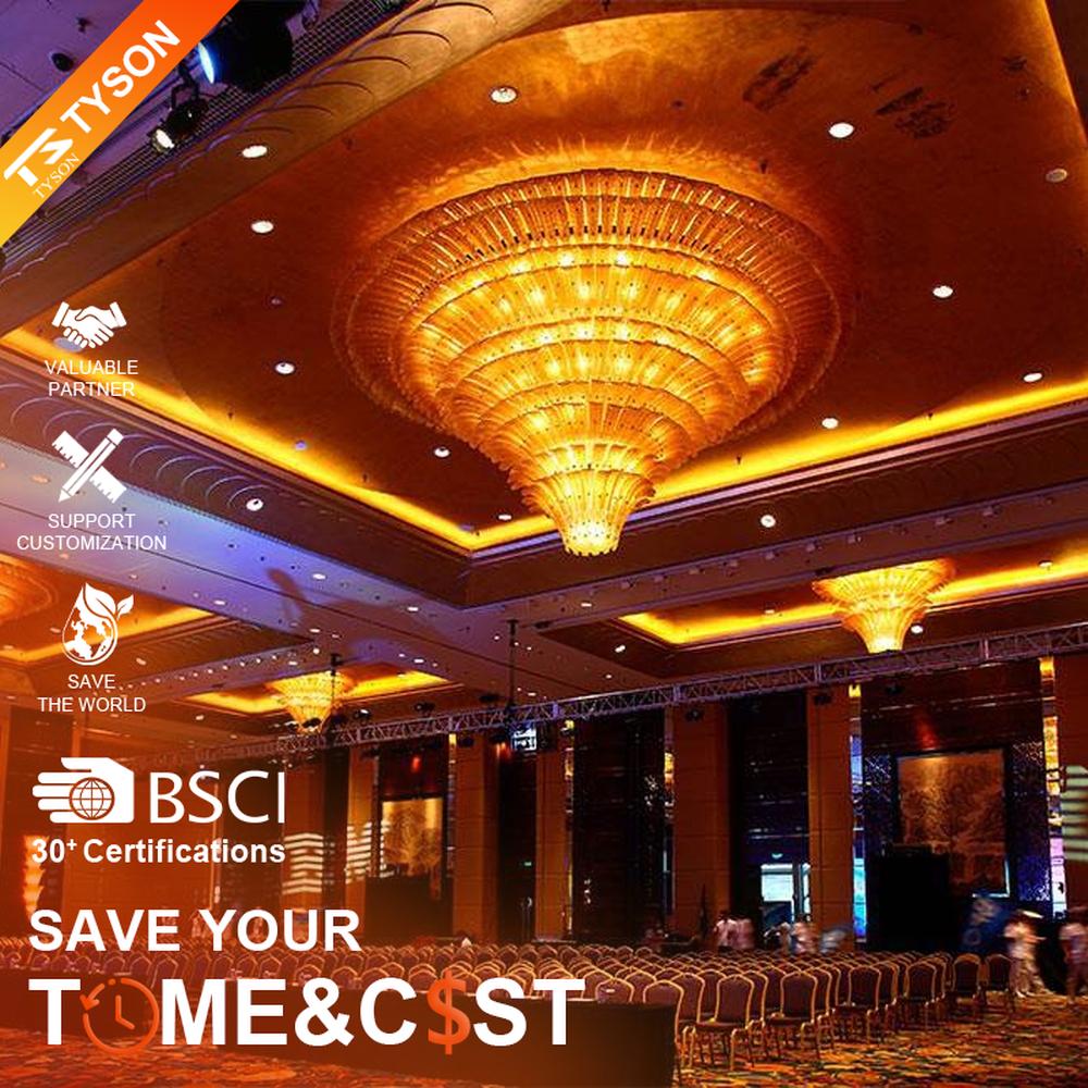 European luxury dome-style multi-layer crystal chandelier, with a golden metal frame and transparent crystal layered structure, featuring bright and grand light, combining main lighting and space decoration functions, suitable for large-scale commercial spaces such as hotel banquet halls, high-end clubs, and large conference halls.