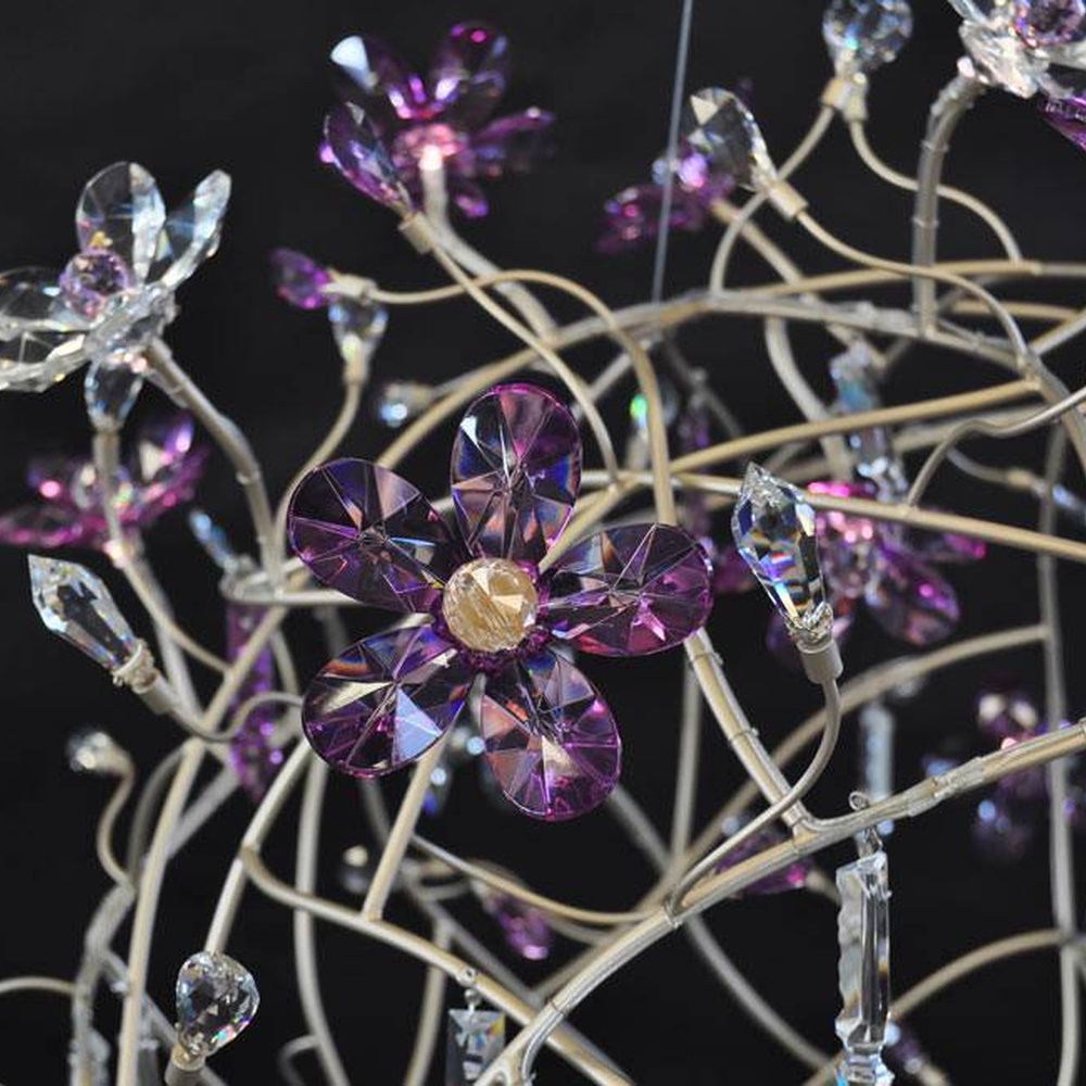 Modern artistic dandelion-shaped chandelier, with metal branches and crystal/glass particles creating a radial spherical structure, featuring bright and soft light, combining decorative and lighting functions, suitable for living rooms, dining rooms, high-end clubs and other modern art style spaces.