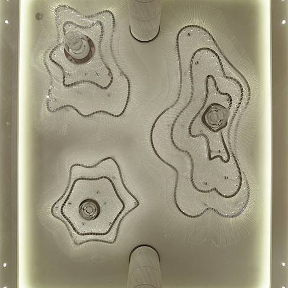 This large wave-shaped crystal ceiling lamp consists of dense high-transparency crystal strips forming a flowing wave pattern, covering the entire ceiling, with soft and brilliant light, serving both lighting and installation art purposes, suitable for large high-ceiling spaces such as hotel lobbies and high-end commercial atriums.