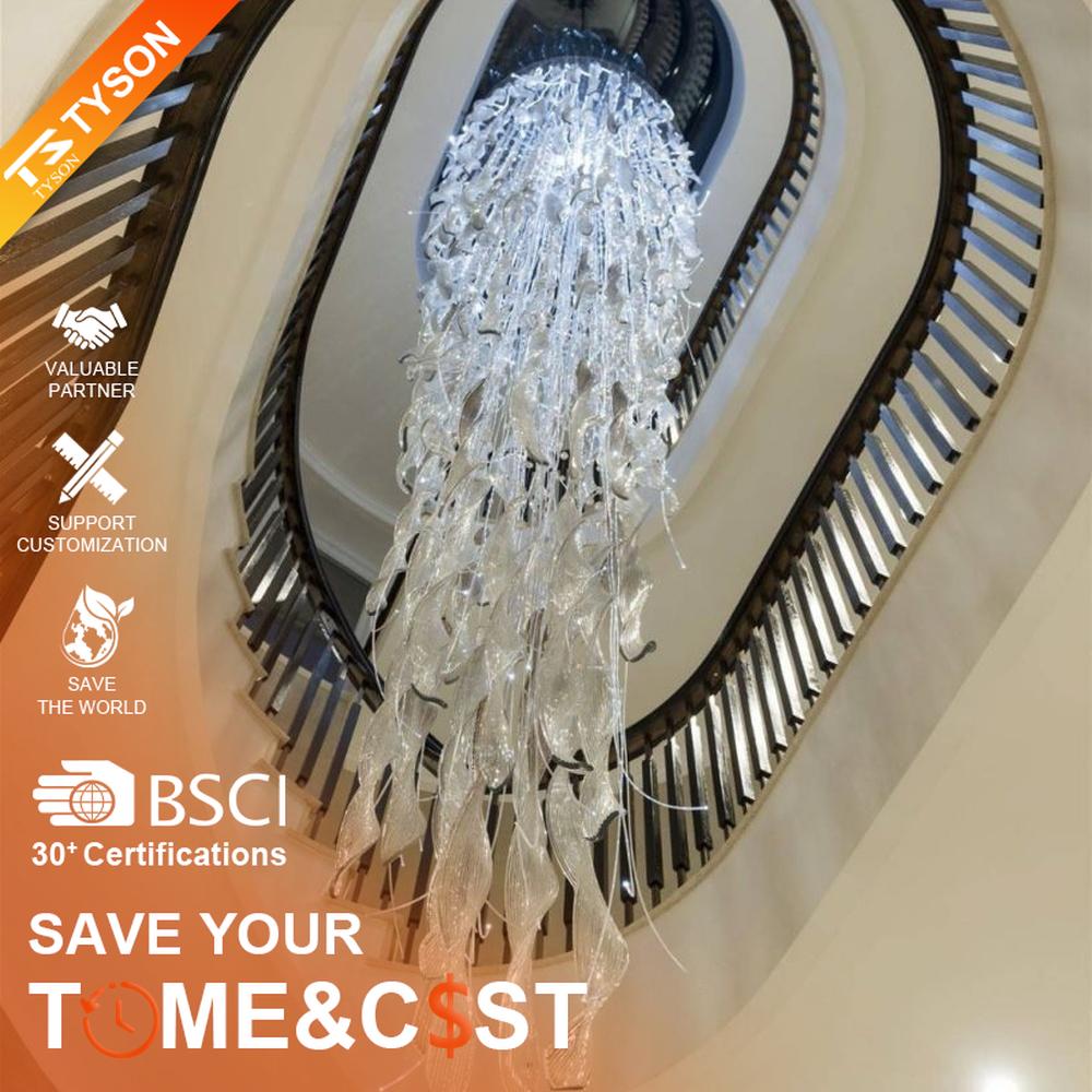 Modern artistic feather-shaped hanging crystal chandelier, composed of layered transparent crystal strips and spherical crystals, with a light feather-like appearance, combining artistic decoration and main lighting functions, suitable for large-scale spaces such as villa high-ceiling staircases, hotel lobbies and high-end clubs.