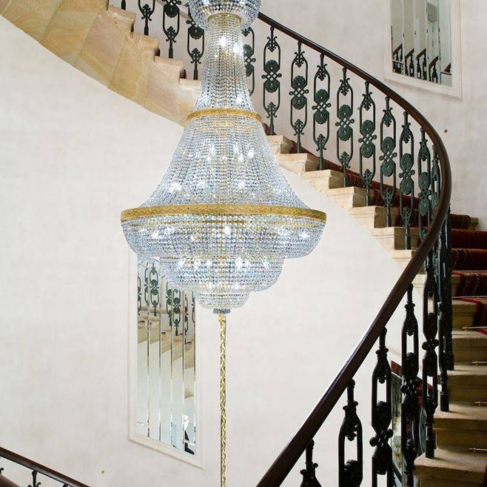 This European court-style golden goblet vase multi-layer crystal chandelier features a gold metal frame paired with dense high-transparency crystals, forming a multi-layer tower structure in the shape of a vase, with brilliant and luxurious light, serving both lighting and decorative purposes, suitable for high-end high-ceiling spaces such as villa high-ceiling staircases and hotel lobbies.