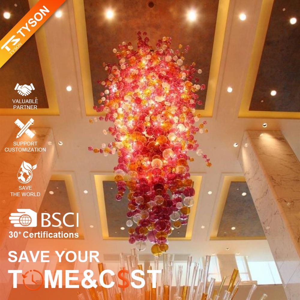 Modern artistic flower cluster-shaped hanging chandelier, with pink-orange gradient crystal/acrylic petals stacked into a full flower cluster shape, combining artistic decoration and main lighting functions, suitable for high-ceiling large-scale spaces such as hotel lobbies, high-end clubs, and commercial atriums.
