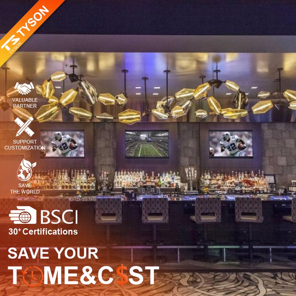 This modern art liuli chandelier features black metal brackets connecting irregular golden liuli leaves, with transparent and soft light, serving both lighting and decorative purposes, suitable for modern entertainment commercial spaces such as bars and high-end clubs.