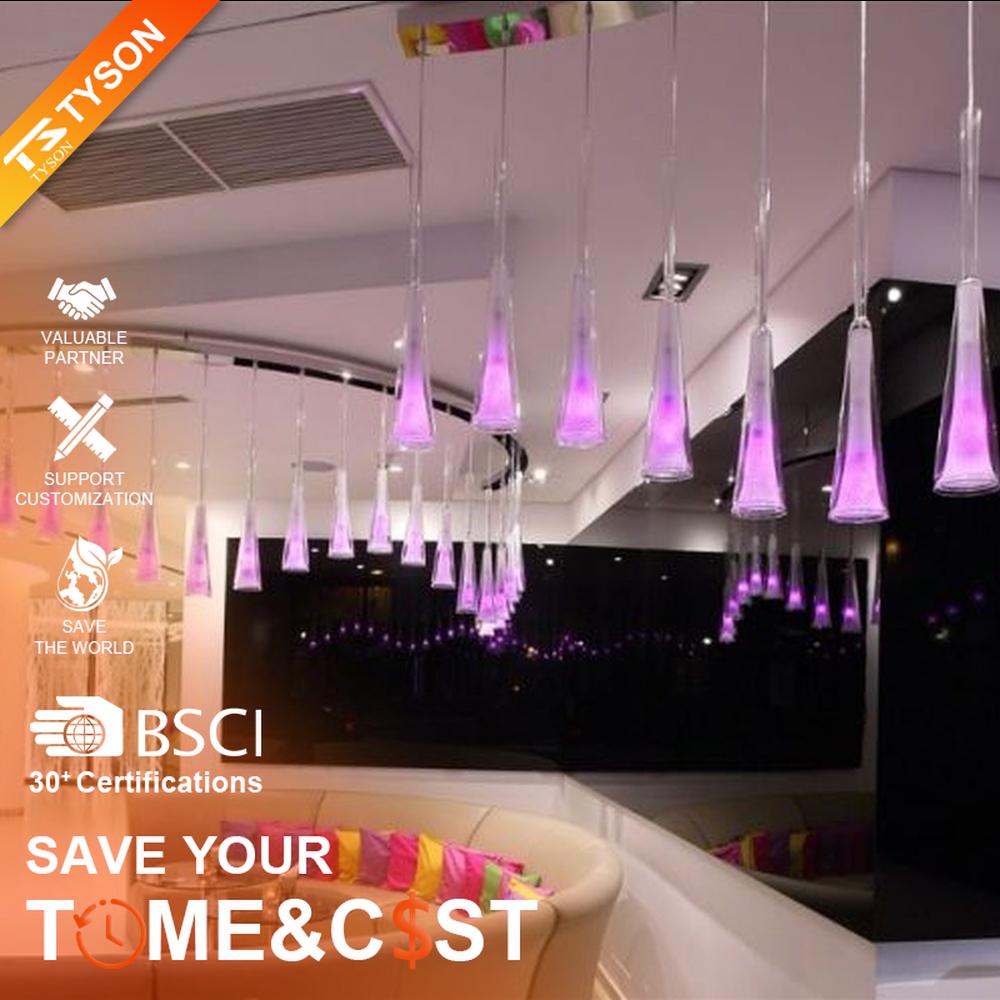 This modern gradient cone LED chandelier features transparent conical lampshades paired with LED gradient pink-purple light sources, arranged in a staggered drooping manner with slender suspension rods, with soft and dreamy light, serving both lighting and decorative purposes, suitable for modern entertainment commercial spaces such as bars and lounges.