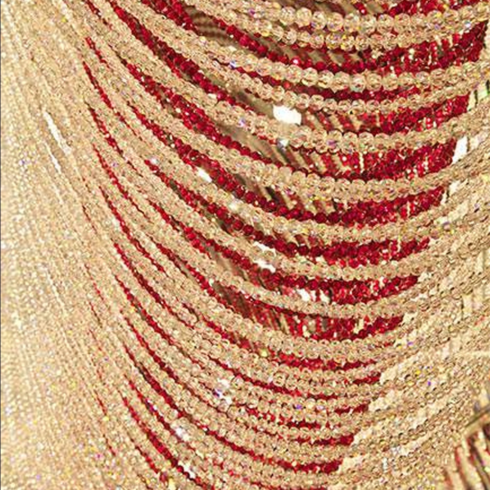 Modern luxury red-white gradient wavy crystal ceiling lamp, with dense crystal particles creating a flowing wavy shape, the red-white gradient texture has strong visual tension, combining decorative and main lighting functions, suitable for large-scale commercial spaces such as high-end banquet halls, clubs, and hotel lobbies.