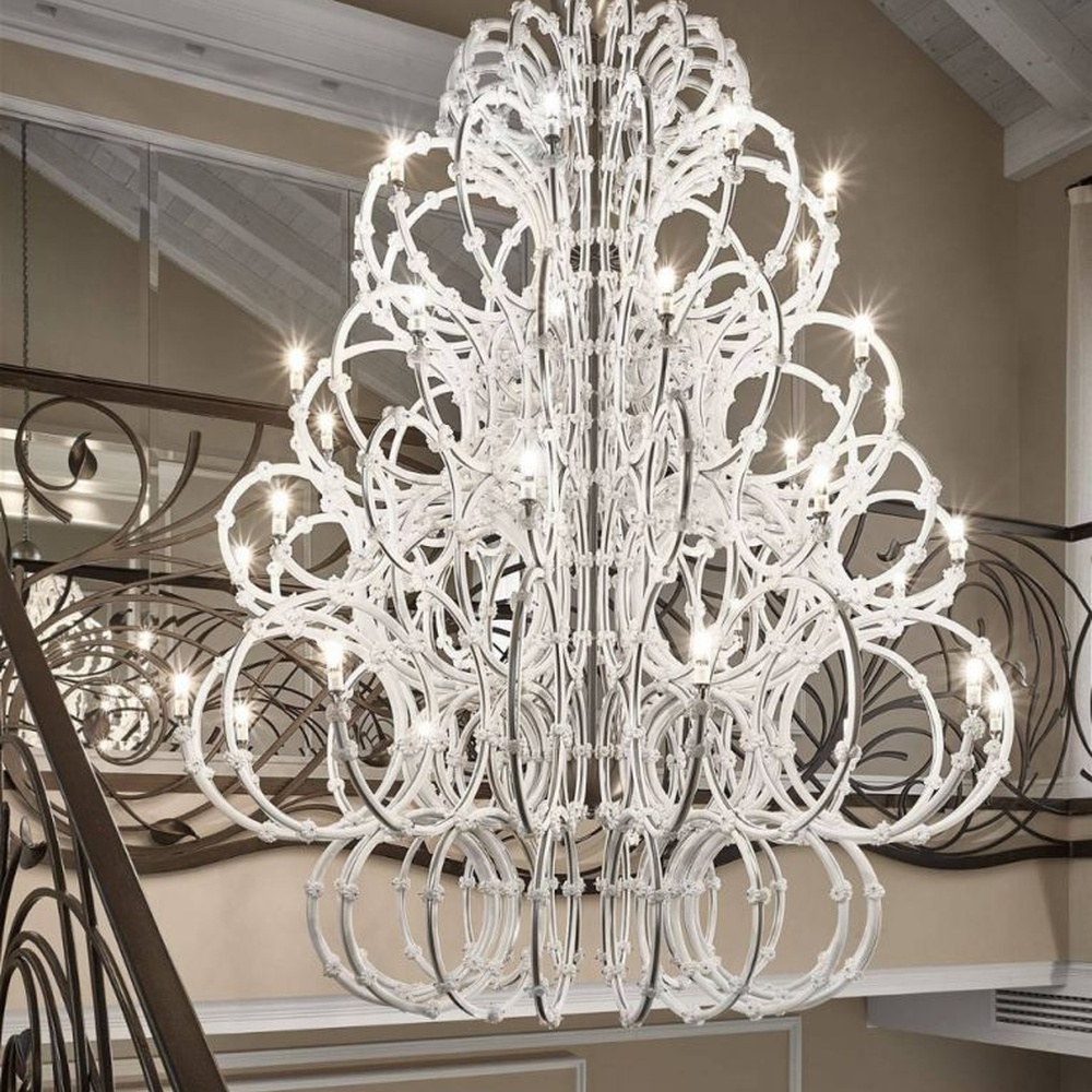 This large white crystal corolla art chandelier is handcrafted with high-transparency glass/crystal into a layered, curled ring structure, forming a blooming corolla shape, with brilliant and soft light, serving both lighting and decorative purposes, suitable for high-end high-ceiling spaces such as villa high-ceiling living rooms and hotel lobbies.