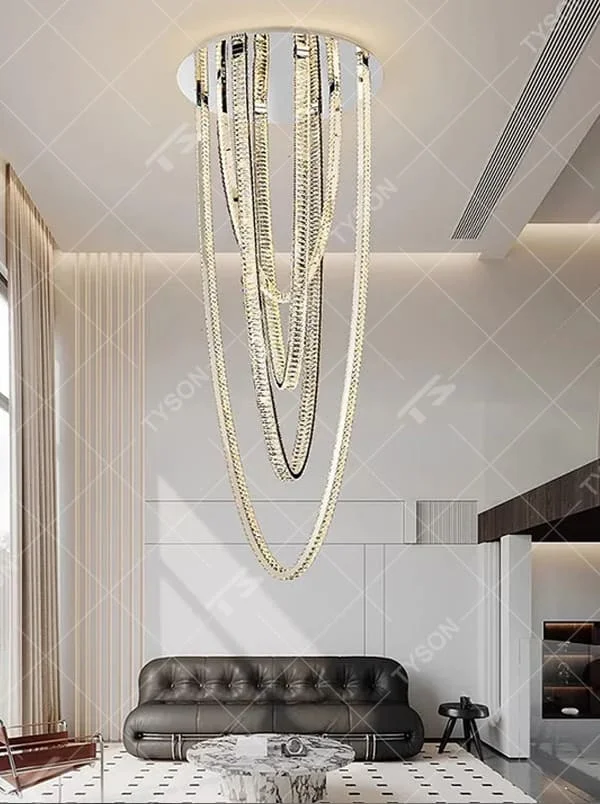 This is a modern artistic chain chandelier with a multi-layered golden chain design, unique and layered, showing a luxurious artistic sense. It is used for space lighting and decoration, enhancing the luxurious artistic atmosphere of the space. It is suitable for high-ceiling villa living rooms, high-end hotel lobbies, art spaces and other places.