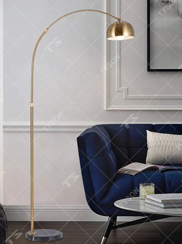 This is a modern luxury arc floor lamp with a golden curved lamp pole, a black marble base, and a golden dome lampshade. It features a simple and elegant design, combining artistry and practicality. It is used for space lighting and decoration, creating a luxurious and fashionable ambiance. It is suitable for modern home living rooms, luxury apartment living areas, high-end hotel leisure spaces and other places.