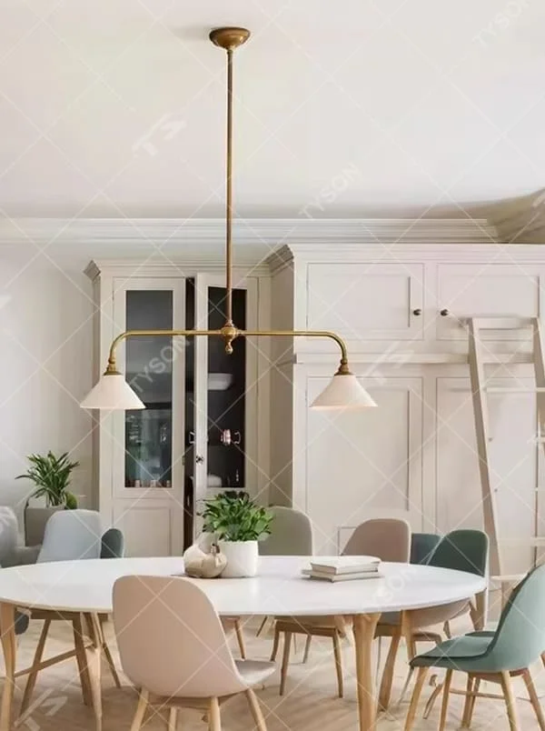 This is a Nordic retro-style double-head chandelier, with a golden metal stand and white conical lampshades, featuring a minimalist retro design and warm texture. It is used for space lighting and decoration, creating a warm retro atmosphere. It is suitable for Nordic-style restaurants, retro-style home living rooms, homestay dining areas and other places.