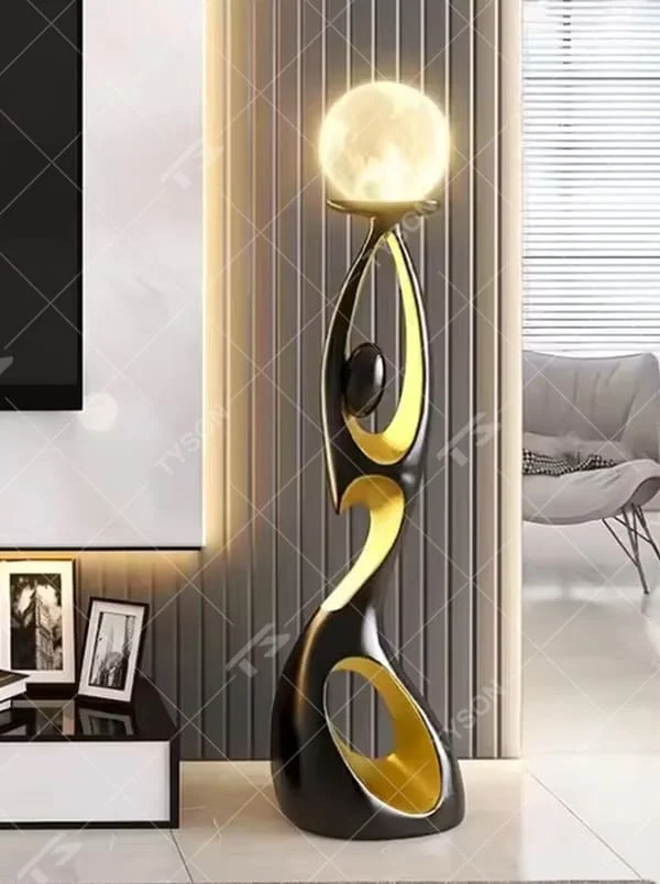 This is an artistic human-shaped black-gold floor lamp, featuring a black-gold artistic human sculpture holding a moon-shaped luminous lamp, with strong artistic sense and modern luxury style. It is used for space lighting and decoration, creating an artistic atmosphere. It is suitable for modern art home living rooms, high-end hotel lobbies, art exhibition halls and other places.