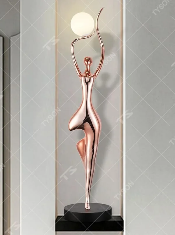 This is a modern artistic human-shaped floor lamp with a rose gold artistic human figure and a spherical lampshade, featuring a strong sense of art and modernity. It is used for space lighting and decoration, creating an artistic and distinctive ambiance. It is suitable for modern art-style homes, high-end clubs, art exhibition halls and other places.