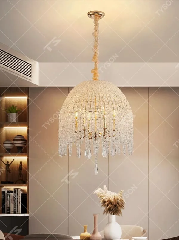 This is a luxury hemispherical crystal chandelier, with a golden frame and multi-layer crystals forming a hemispherical shape, and flexible crystal pendants, featuring a luxurious and elegant design. It is used for space lighting and decoration, creating a high-end luxury atmosphere. It is suitable for luxury-style home living rooms, high-end restaurants, luxury clubs and other places.