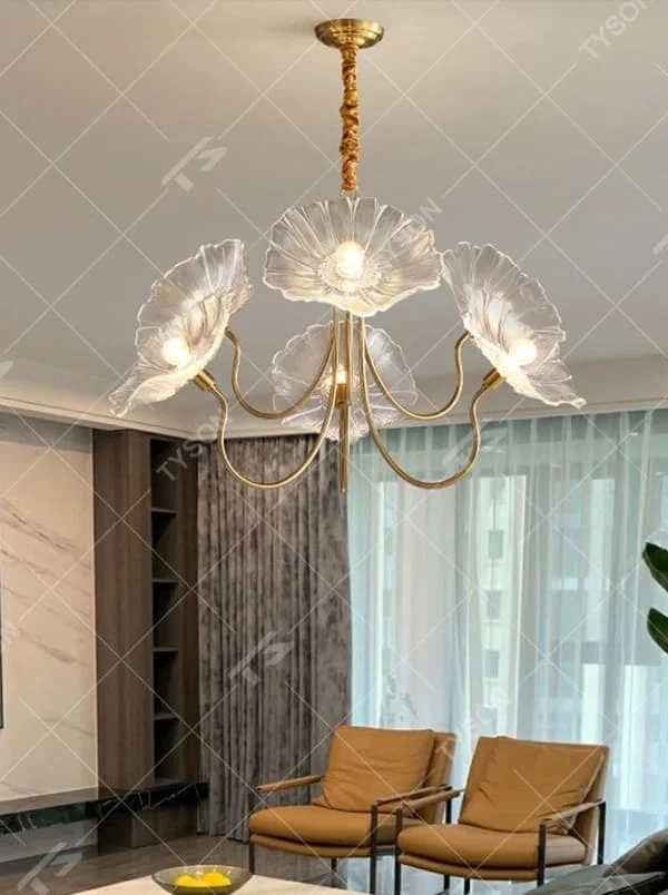 This is an artistic flower-shaped chandelier with a golden metal frame and red glass flower lampshades, featuring a retro luxury design with strong artistic sense. It is used for space lighting and decoration, creating an artistic luxury atmosphere. It is suitable for luxury-style home living rooms, art restaurants, soft decoration display spaces and other places.