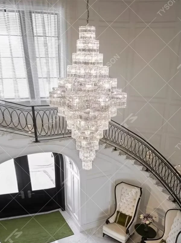 This is a luxury multi-layer pagoda-shaped crystal chandelier, with transparent crystal components in a multi-layer pagoda shape, brilliant lighting, featuring a magnificent and luxurious design with strong visual impact. It is used for space lighting and decoration, creating a high-end luxury atmosphere. It is suitable for high-end hotel lobbies, luxury villa high-ceilinged living rooms, large commercial exhibition halls and other places.
