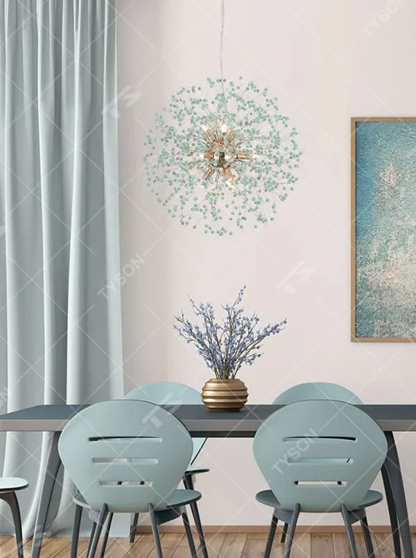 This is an artistic dandelion-shaped chandelier with blue-green crystal beads in a spherical divergent design and a golden central bracket, featuring a fresh and artistic sense. It is used for space lighting and decoration, creating a fresh and luxurious atmosphere. It is suitable for Nordic-style home living rooms, art foyers, luxury restaurants and other places.