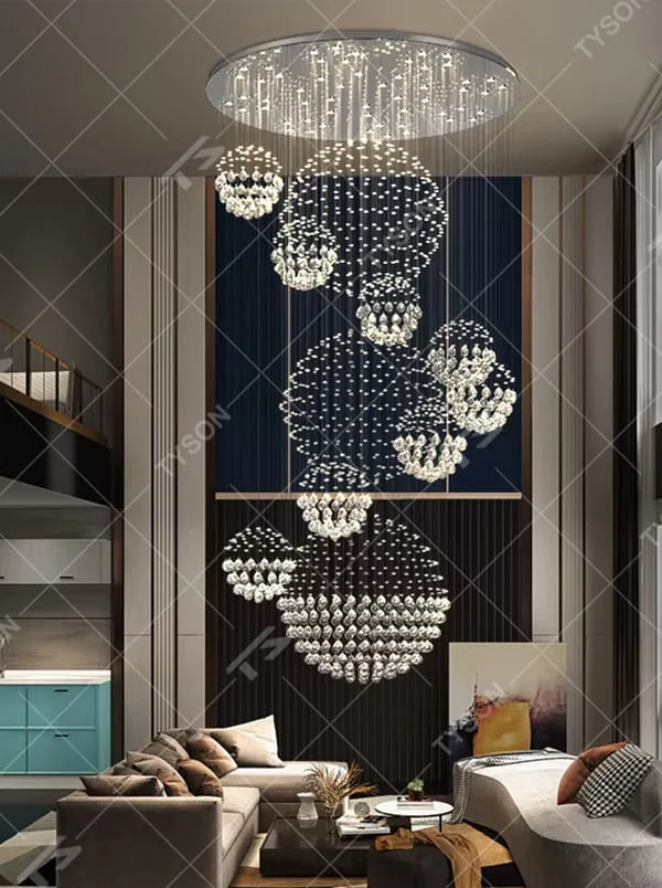 This is a modern luxurious multi-layer spherical crystal chandelier, composed of multiple transparent crystal balls forming spherical structures hung in layers. It features strong artistic sense and spatial decorativeness, with brilliant and grand lighting. It is used for space lighting and artistic decoration, creating a luxurious and high-end atmosphere. Suitable for high-ceiling lobbies of high-end hotels, double-height living rooms in luxury villas, large art exhibition halls and other places.