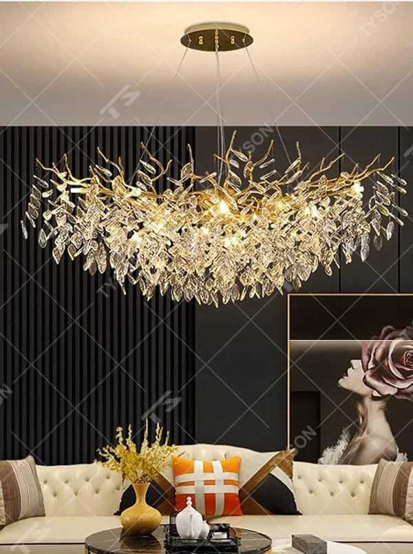 This is a luxurious artistic golden branch crystal chandelier, with a golden metal branch structure and numerous crystal leaves, featuring strong artistic sense and luxury. It is used for space lighting and decoration, creating a high-end luxurious atmosphere. Suitable for luxury villa living rooms, high-end hotel banquet halls, European-style restaurants and other places.