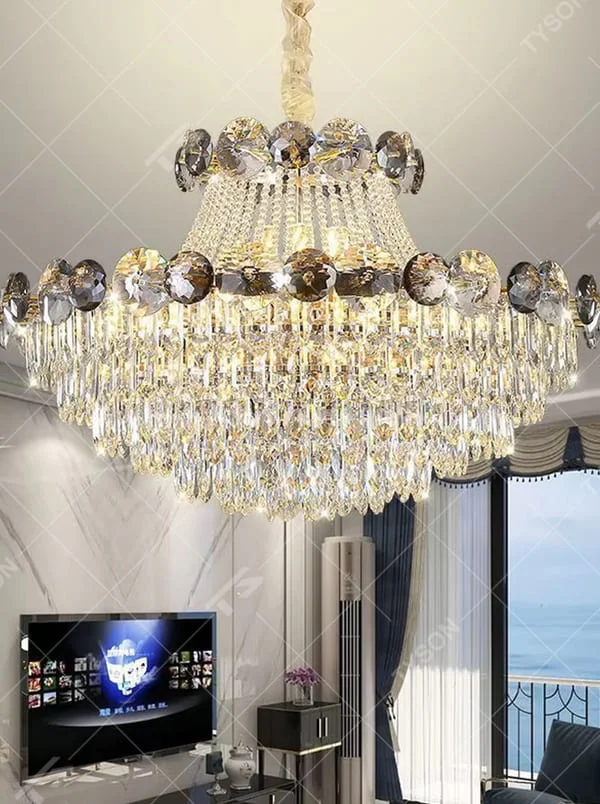 This is a luxurious classical multi-layer crystal chandelier, combining transparent and smoky gray crystals with a multi-layer hanging design. It features brilliant lighting and grand luxury. It is used for space lighting and decoration, creating a luxurious and noble atmosphere. Suitable for luxury living rooms, high-end hotel lobbies, villa banquet halls and other places.