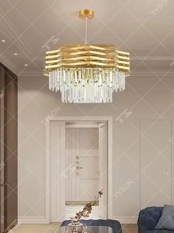 This is a light luxury modern-style golden geometric crystal chandelier, with a multi-layer golden geometric metal frame paired with numerous transparent crystal pendants. It features a grand and luxurious design with brilliant lighting. It is used for space lighting and decoration, creating a light luxury high-end atmosphere. Suitable for light luxury-style living rooms, high-end restaurants, luxury villas and other places.