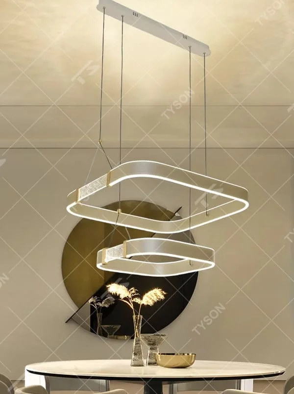 This is a modern minimalist white double-ring chandelier, with double-layer white ring lamp bodies and partial embedded crystal elements, featuring a minimalist and grand design, soft lighting. It is used for space lighting and decoration, creating a modern and warm atmosphere. Suitable for modern minimalist restaurants, living rooms, creative office areas and other places.