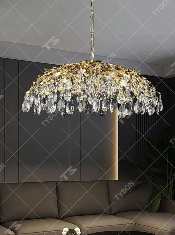 This is a luxurious artistic golden branch crystal chandelier, with a golden metal branch structure and numerous crystal pendants, featuring strong luxury and artistic sense, brilliant lighting. It is used for space lighting and decoration, creating a high-end luxurious atmosphere. Suitable for luxury villa living rooms, high-end hotel banquet halls, European-style restaurants and other places.