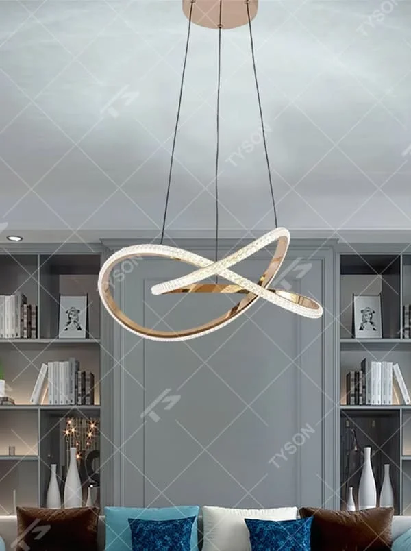 This is a modern artistic golden crossed ring chandelier, with a golden metal crossed ring structure and embedded crystal elements, featuring a minimalist and grand design, brilliant lighting. It is used for space lighting and decoration, creating a modern luxurious atmosphere. Suitable for modern minimalist living rooms, high-end creative restaurants, designer studios and other places.