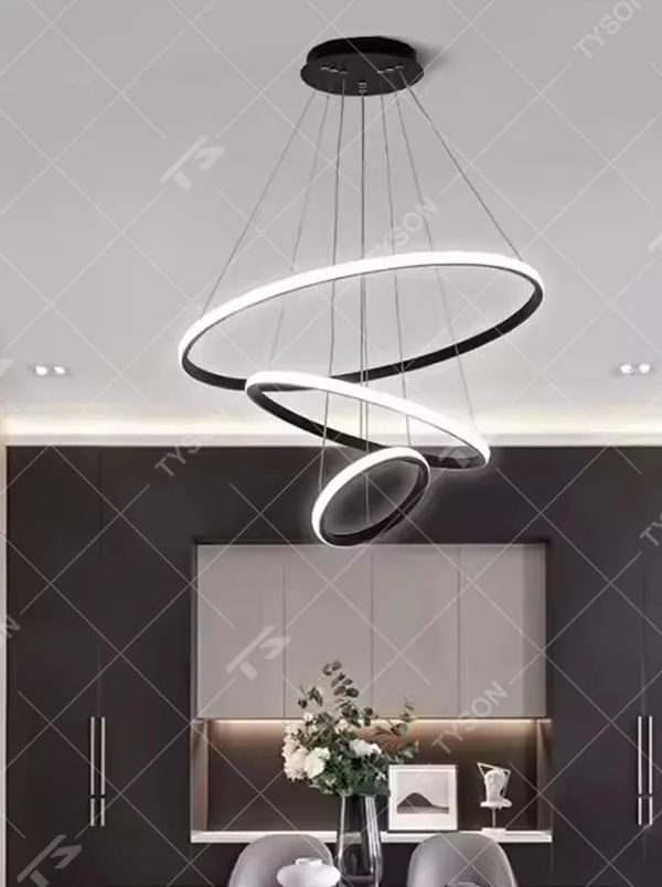 This is a modern smart-style golden ring multi-layer chandelier, with multiple golden ring light strips hanging in layers. It supports 3 levels of brightness and 3 color temperatures (warm light, neutral light, white light) adjustment. The design is minimalist and grand, and the lighting effect can be adjusted according to needs. It is used for space lighting and atmosphere creation, suitable for modern minimalist living rooms, light luxury-style bedrooms, high-end offices and other places.
产品介绍
