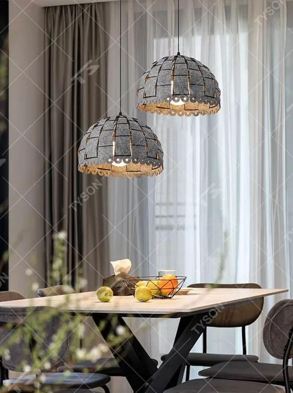 This is a modern minimalist gray spliced dome chandelier, with a gray spliced dome shape and lace-like details on the edge, featuring a minimalist and textured design. It is used for space lighting and decoration, creating a warm and modern atmosphere. Suitable for modern minimalist restaurants, Nordic-style home living rooms, creative cafes and other places.
