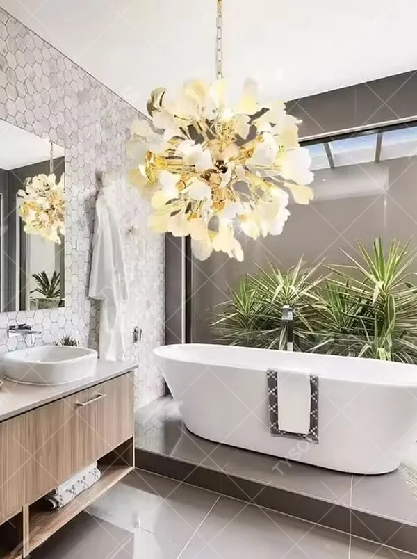 This is a light luxury elegant flower-shaped chandelier, with a golden metal frame paired with white petal lampshades, shaped like a blooming flower. The lighting is soft and warm, suitable for high-end bathroom spaces.