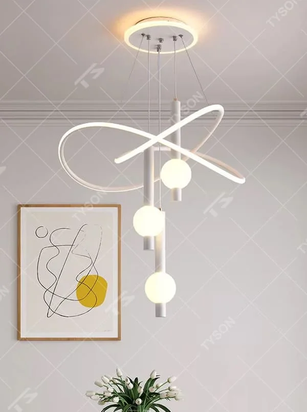 This is a modern creative cross-ring spherical chandelier, featuring white cross-ring light strips paired with spherical lamp bodies. The design is simple and artistic, with soft and uniform lighting. It is used for space lighting and decoration to create a modern artistic atmosphere. Suitable for modern-style living rooms, minimalist dining areas, modern apartments and other places.