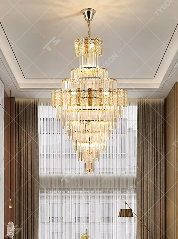 Luxurious multi-layer crystal tower chandelier, golden frame paired with transparent crystals, layered shape with brilliant lighting, creating a high-end luxurious atmosphere.