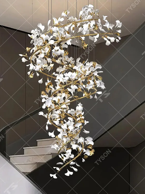 This is an artistic natural-style spiral ginkgo leaf decorative chandelier, with a golden spiral frame paired with white and golden ginkgo leaf-shaped decorations. The design combines artistic sense and natural charm, being luxurious and exquisite, with soft and elegant lighting. It is used for space lighting and artistic decoration, creating an artistic and natural luxurious atmosphere. Suitable for high-ceiling stairwells of high-end hotels, luxury villa living rooms, art exhibition halls and other places.