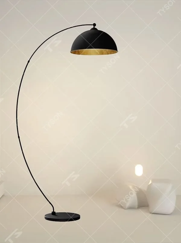 This is a modern minimalist light luxury curved floor lamp, with a black curved lamp pole paired with a black-outside-gold-inside hemisphere lampshade, and a black disc base. The lighting is soft and warm, creating a minimalist high-end atmosphere.