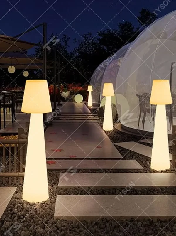 This is an outdoor warm-style conical luminous floor lamp, featuring an integrated conical cylinder + small conical lampshade shape, waterproof material suitable for outdoor environments, soft warm light, creating a comfortable and warm outdoor atmosphere.