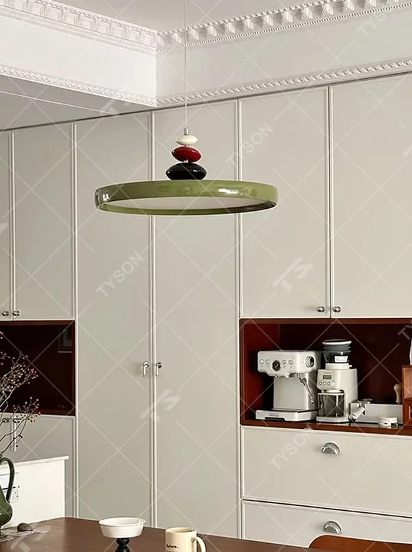 Vintage light luxury olive green circular chandelier, paired with white, red and black bead decorations, soft lighting, creating a warm and elegant space atmosphere.