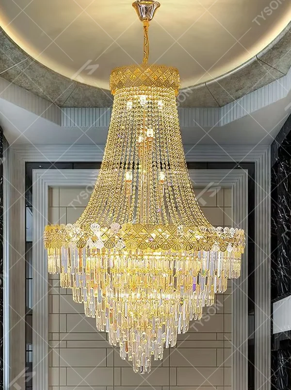Luxurious umbrella-shaped layered gold-decorated crystal chandelier, golden frame paired with dense crystal pendants and golden decorative patterns, brilliant and gorgeous lighting, creating a high-end luxurious atmosphere.