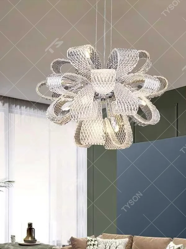 Modern art light luxury woven bow-shaped transparent texture chandelier, golden textured woven pattern + warm light effect, creating a flexible luxurious artistic atmosphere.