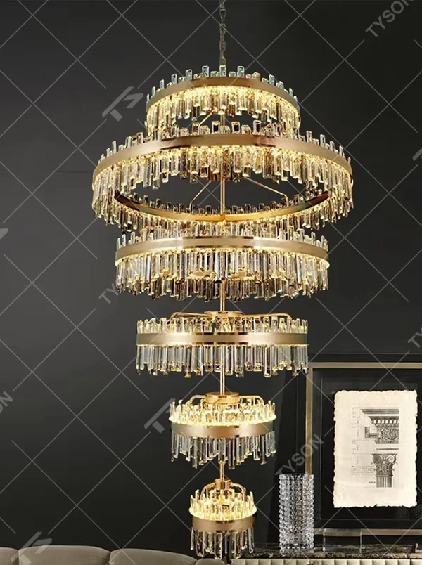 Modern top-luxury multi-layer ring crystal chandelier, golden frame + gradient ring design + full crystal inlay, brilliant warm light creates high-end luxurious atmosphere.