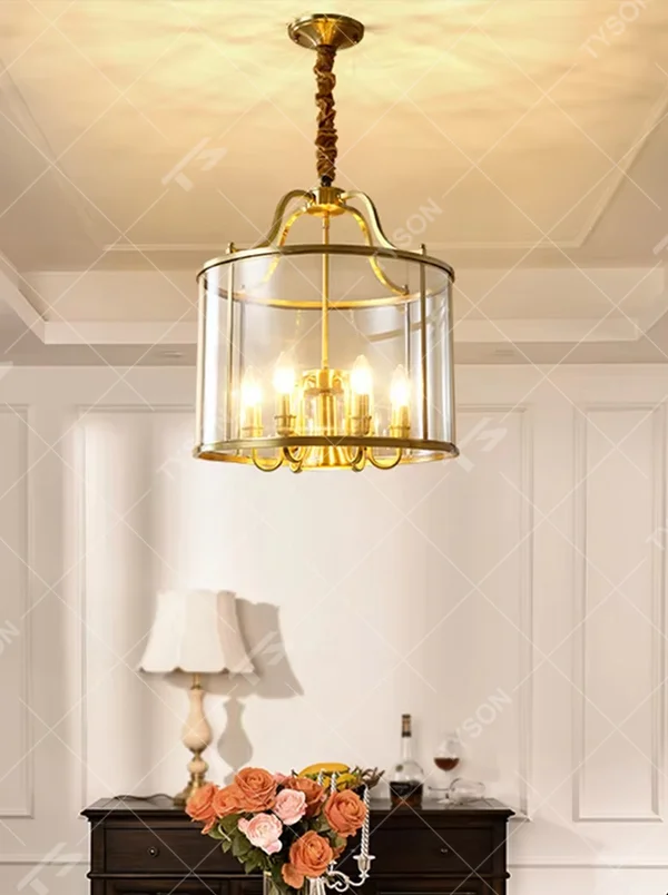 Light luxury golden metal frame glass cover candelabra chandelier, golden metal frame + transparent glass outer cover + candle-shaped bulbs, soft warm light, creating a vintage light luxury bedroom atmosphere.
