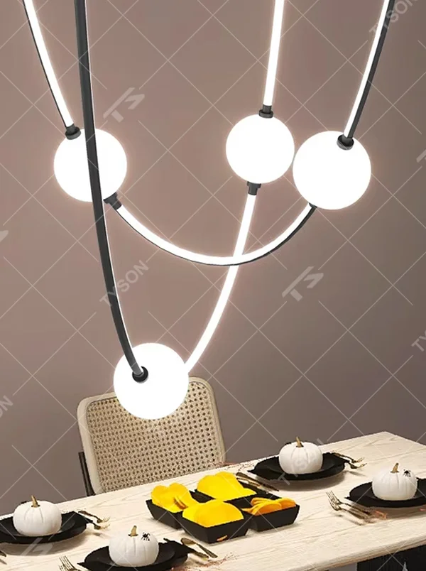 Modern creative curved frame hanging chandelier, black curved metal frame + white light strip + white spherical lampshades, soft and flexible lighting, creating an artistic minimalist atmosphere.