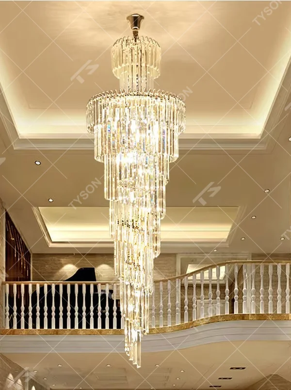 Top-tier luxurious multi-layer crystal column high-ceiling chandelier, stacked transparent long crystal columns + brilliant refraction light effect, creating a noble luxurious high-ceiling space atmosphere.
