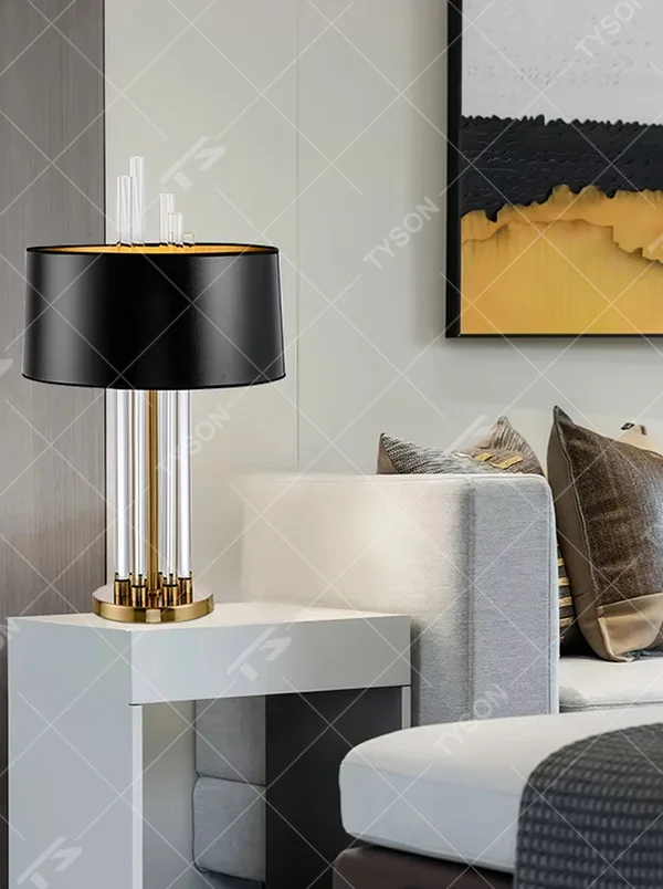 Light luxury black-gold crystal column table lamp, black cylindrical lampshade (gold lining) + transparent crystal lamp pole + gold base, elegant lighting, creating a high-end light luxury atmosphere.