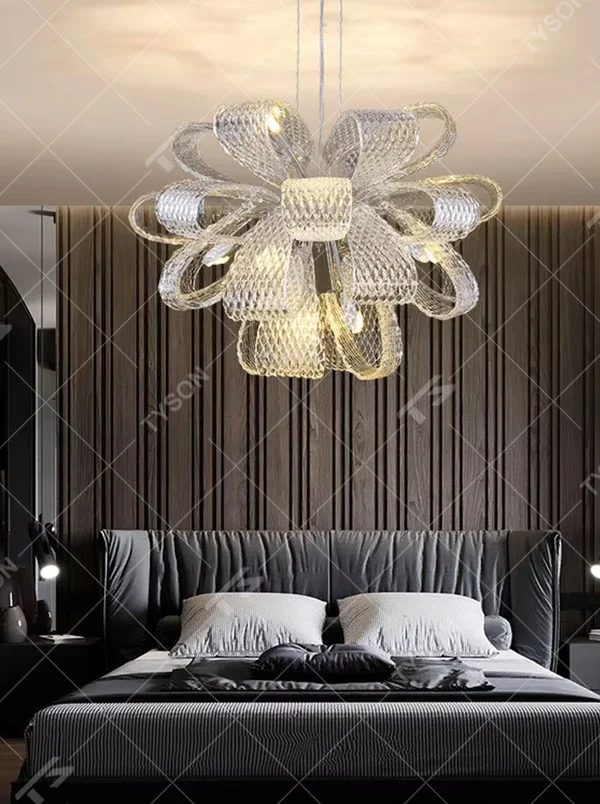Modern art flower-shaped textured transparent light luxury chandelier, silver-toned frame + warm light effect, creating an artistic light luxury home atmosphere.