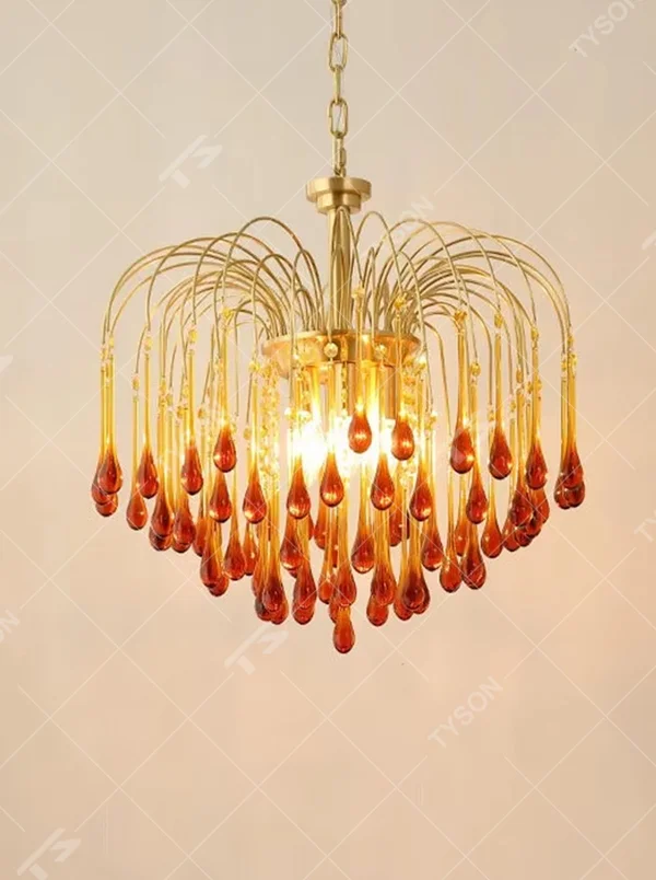 Vintage light luxury golden metal wireframe amber waterdrop glass chandelier, warm light effect, creating a cozy vintage luxurious atmosphere.