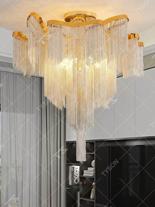 Modern light luxury golden frame light blue crystal tassel layered ceiling chandelier, warm light effect, creating an elegant and exquisite space atmosphere.
