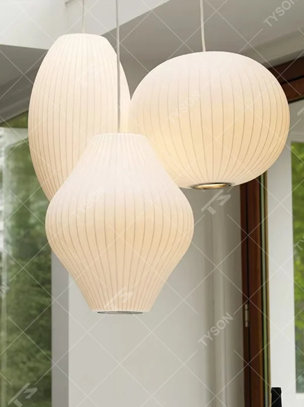 Japanese minimalist style multi-shape beige striped fabric lampshade track multi-head pendant light, warm light effect, creating a soft and cozy space atmosphere.
