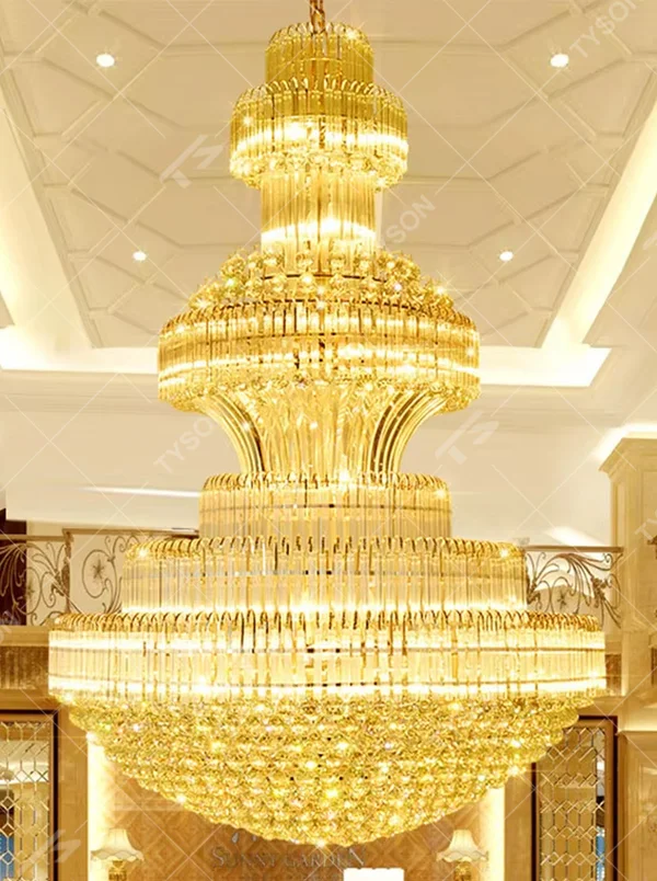 European-style top-luxury multi-layer full golden crystal tower-shaped chandelier, warm light effect, creating an extremely gorgeous top-luxury space atmosphere.