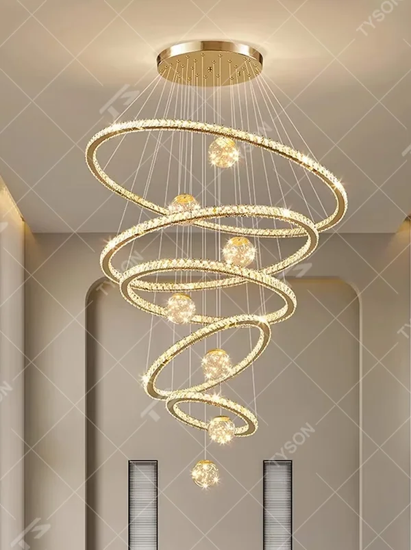 Modern top-luxury spiral ring crystal high-ceiling chandelier, golden frame + full crystal ring inlay + crystal light ball decoration + warm light effect, creating a luxurious artistic atmosphere in high-ceiling spaces.