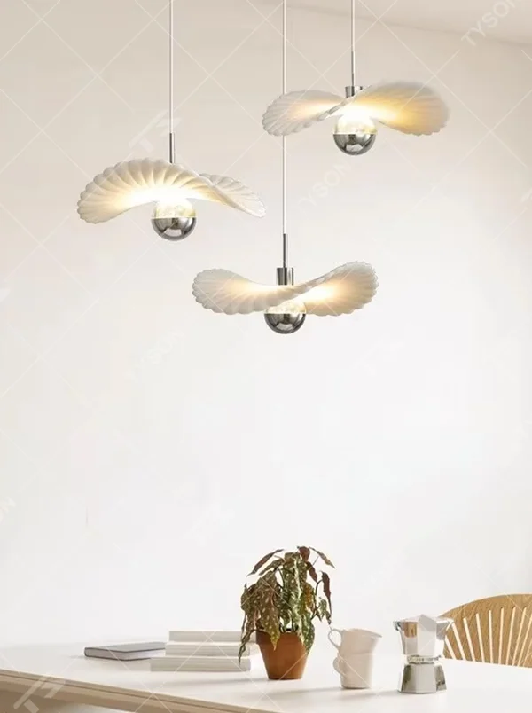 Modern minimalist wing-shaped white shade + silver ball multi-head pendant light, warm light effect, creating a fresh and natural space atmosphere.