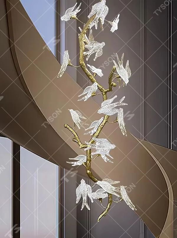 Artistic dead branch bird-shaped golden frame glass chandelier, warm light effect, creating a natural and dynamic creative space atmosphere.